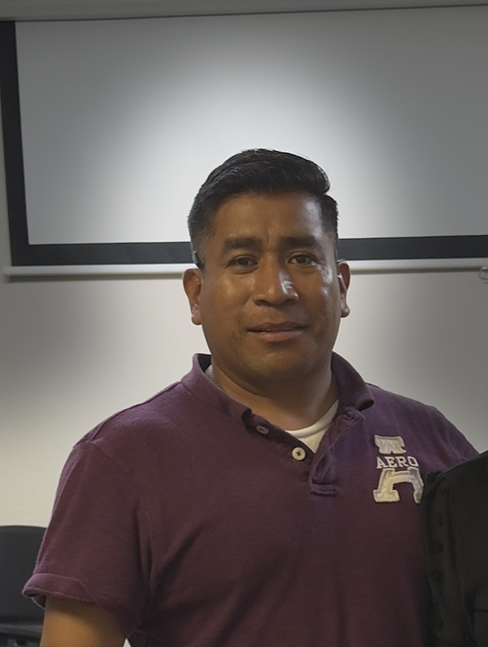Jorge Pedroza, owner of MPG Construction, looking at the camera.